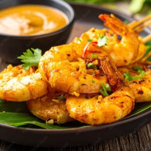 CREVETTES SAUCE PIQUANTE  (250g/pers)